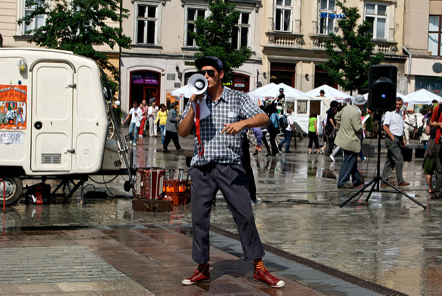 A man using a megaphone to spread a message